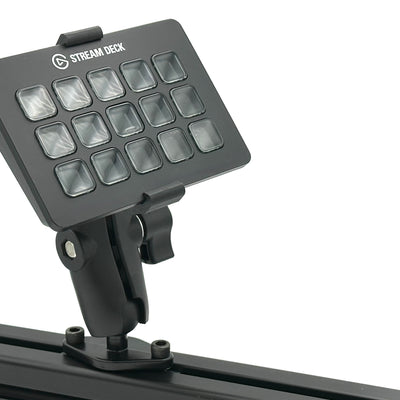 Image 5 — RAM Mount adjustability
Side view of the Stream Deck mount on an 8020 aluminium extrusion cockpit, showing the fully adjustable aluminium RAM Mount arm angled toward the driving or piloting position. The RAM Mount gives complete control over tilt, rotation, and orientation of the 15-key Elgato Stream Deck, letting sim racers and flight simmers fine-tune the viewing angle in seconds without removing the Stream Deck from its 3D printed bucket adapter.