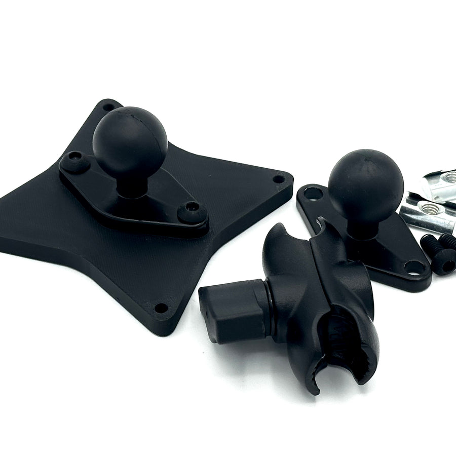 Button Box Mount installed on 40-series aluminium extrusion profile, positioning a compatible VESA button box beside the sim racing wheel. The RAM arm allows the control panel to be angled and positioned for comfortable access to pit commands, brake bias, traction control and camera shortcuts. T-nuts and profile bolts are included, creating a complete mounting setup for compatible 50, 75 and 100 mm VESA devices.