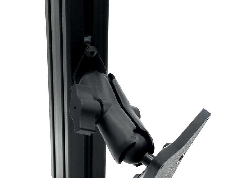 Button Box Mount installed on 40-series aluminium extrusion profile, positioning a compatible VESA button box beside the sim racing wheel. The RAM arm allows the control panel to be angled and positioned for comfortable access to pit commands, brake bias, traction control and camera shortcuts. T-nuts and profile bolts are included, creating a complete mounting setup for compatible 50, 75 and 100 mm VESA devices.