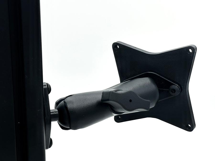 Button Box Mount installed on 40-series aluminium extrusion profile, positioning a compatible VESA button box beside the sim racing wheel. The RAM arm allows the control panel to be angled and positioned for comfortable access to pit commands, brake bias, traction control and camera shortcuts. T-nuts and profile bolts are included, creating a complete mounting setup for compatible 50, 75 and 100 mm VESA devices.