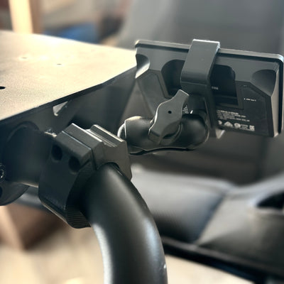 Playseat Trophy 15-key Stream Deck Mount fitted to the tubular cockpit with the RAM arm holding the selected Stream Deck interface. Compatible with the 15-key Elgato Stream Deck MK1, MK2 and Scissor Keys versions, this sim racing mount keeps pit commands, brake bias, camera controls and other shortcuts close to the driving position while preserving a tidy cockpit layout.