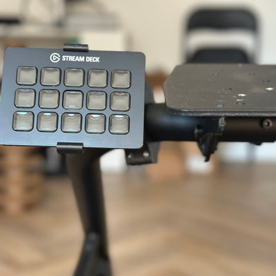 Playseat Trophy Stream Deck Mount showing the 5.5 cm and 9.5 cm RAM arm options for a 15-key Stream Deck or Stream Deck Plus. The short arm keeps the control panel close to the tubular cockpit, while the longer arm offers more reach and positioning freedom. Both versions use the dedicated Playseat Trophy tube clamp and include the mounting hardware needed for installation.