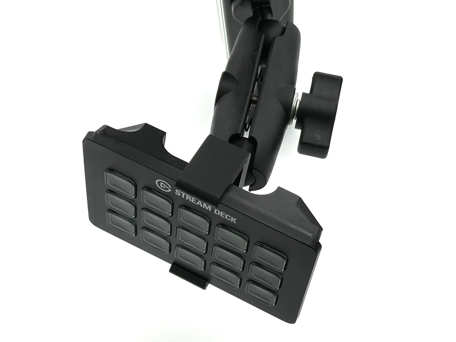 Image 5 — RAM Mount adjustability
Side view of the Stream Deck mount on an 8020 aluminium extrusion cockpit, showing the fully adjustable aluminium RAM Mount arm angled toward the driving or piloting position. The RAM Mount gives complete control over tilt, rotation, and orientation of the 15-key Elgato Stream Deck, letting sim racers and flight simmers fine-tune the viewing angle in seconds without removing the Stream Deck from its 3D printed bucket adapter.